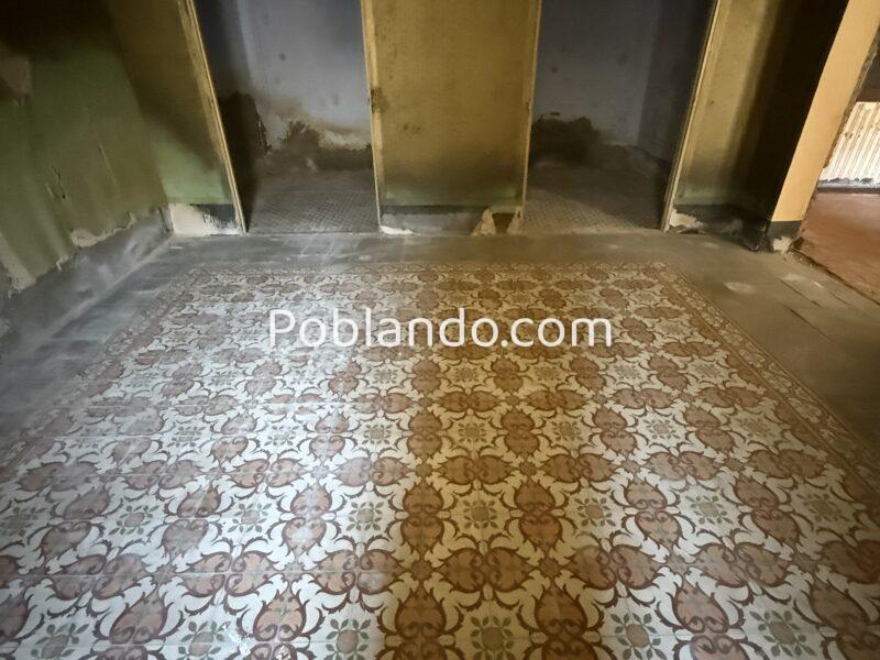 Terreno en el centro del pueblo con casa para rehabilitar