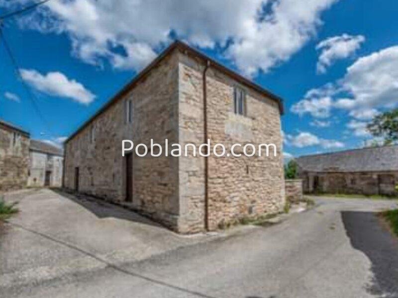 Casa de piedra con parcela