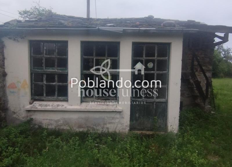 AMPLIA CASA DE DOS PLANTAS CON FINCA EN ESPASANTE