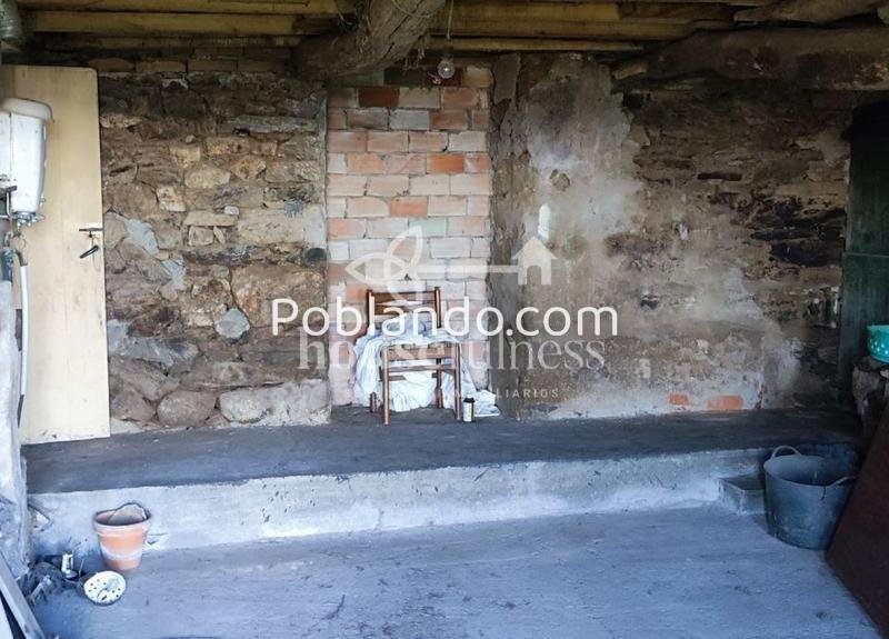 Casa de piedra en el mirador de Fene