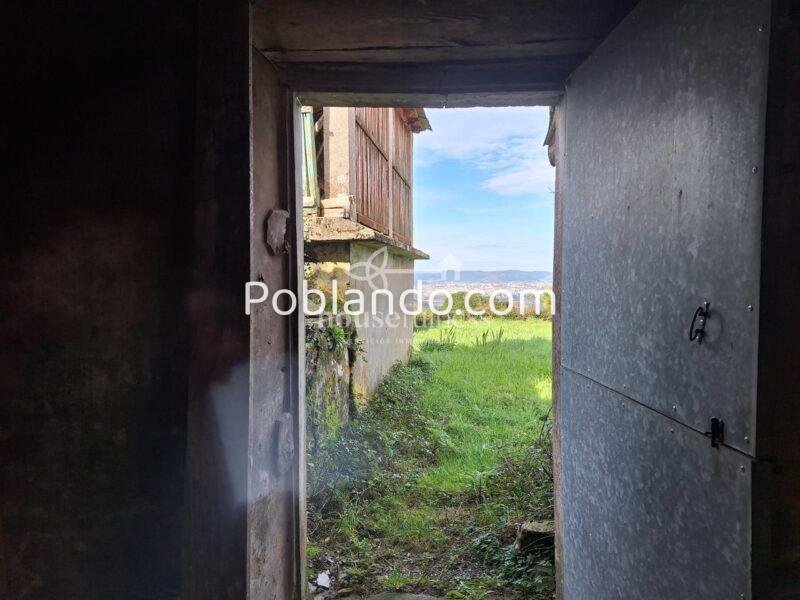 Casa de piedra en el mirador de Fene