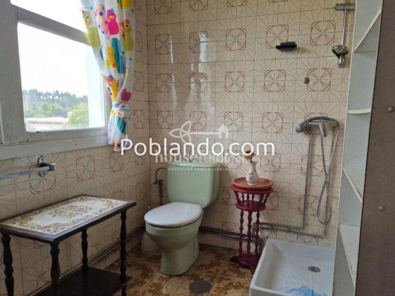 Vivienda con negocio en Moeche