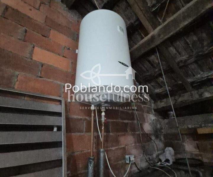 Vivienda con negocio en Moeche