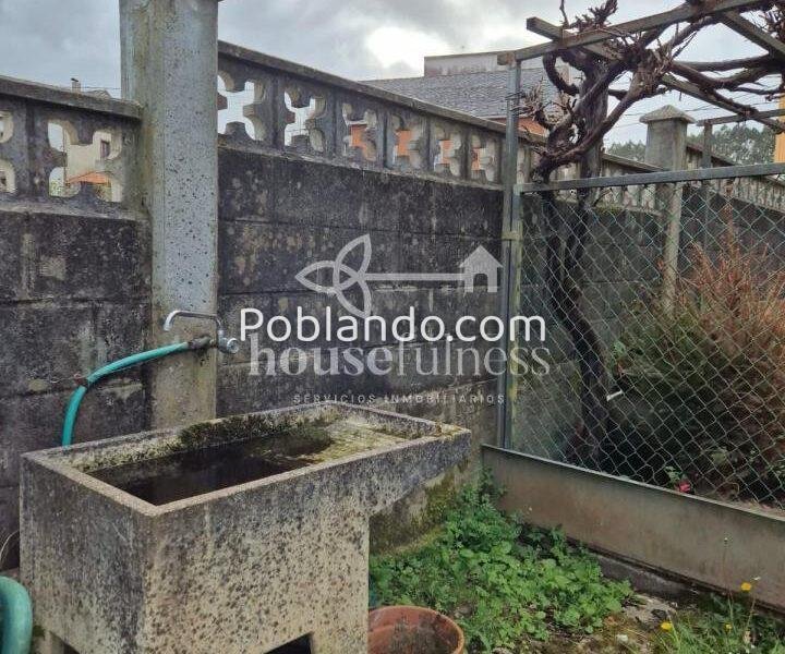 Vivienda con negocio en Moeche