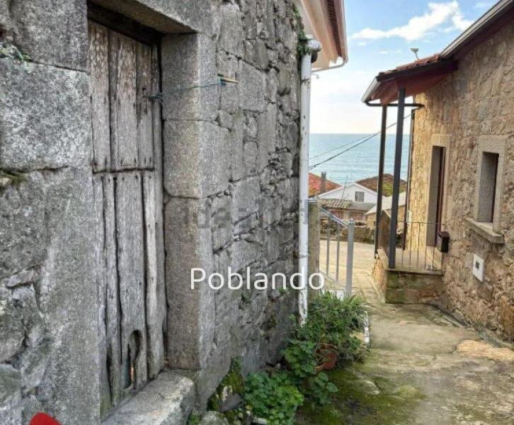 CASA DE PUEBLO PARA REFORMA FRENTE AL MAR - OIA, SUELO EDIFICABLE Y PROYECTO INCLUIDO.
